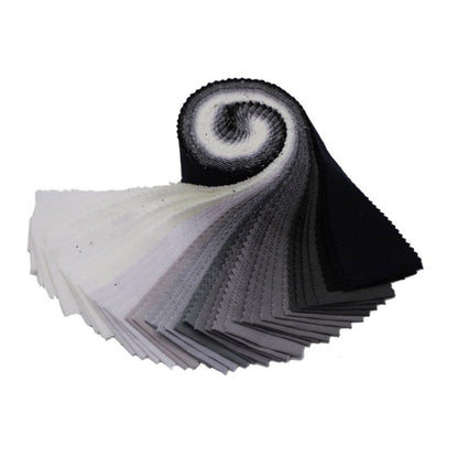 Roll of black and white fabric swatches