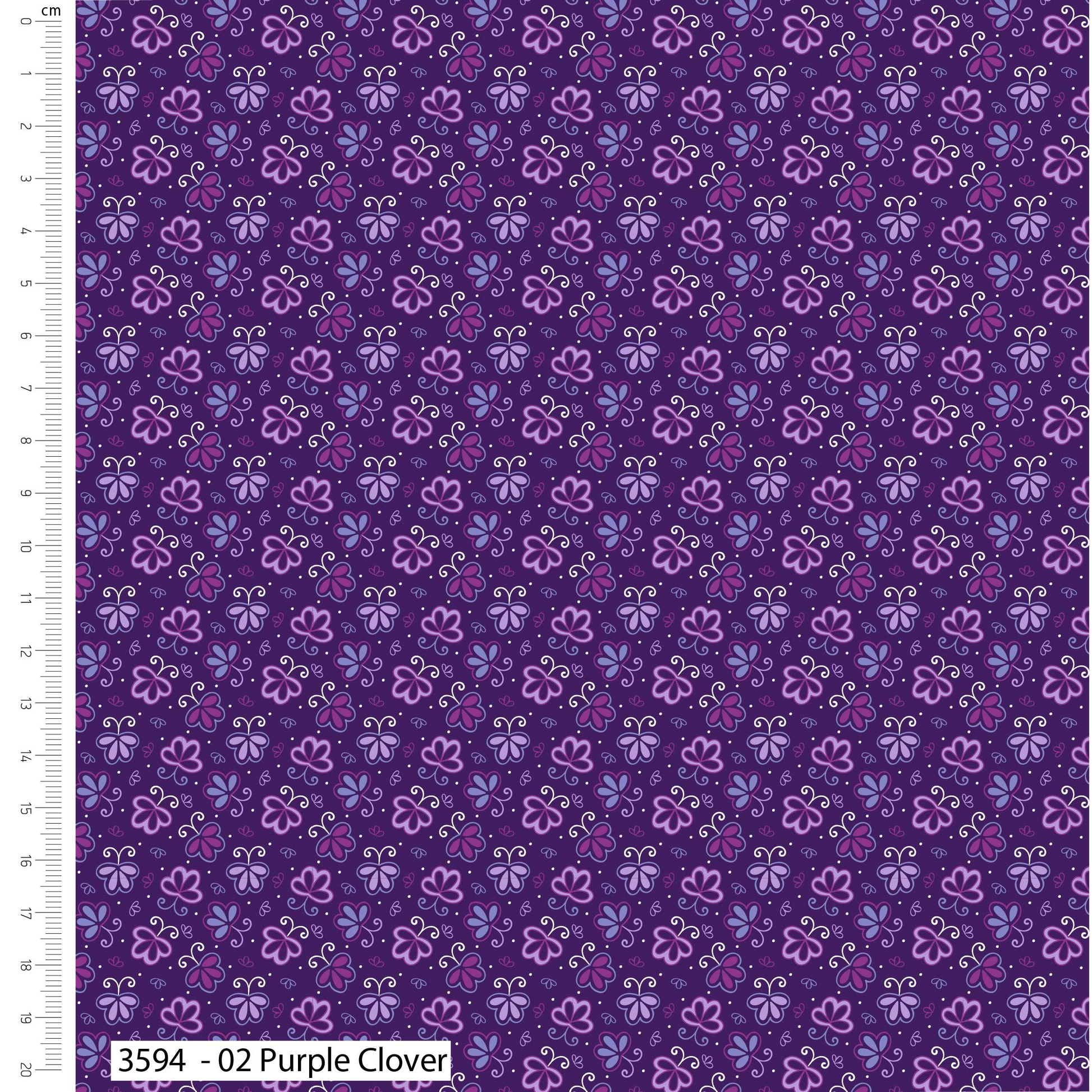 Purple fabric with floral pattern and ruler for scale