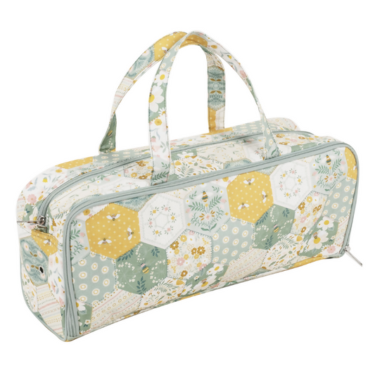 Patchwork Bee Knitting Bag with Pin Case, closed, showing patchwork bee print and handles
