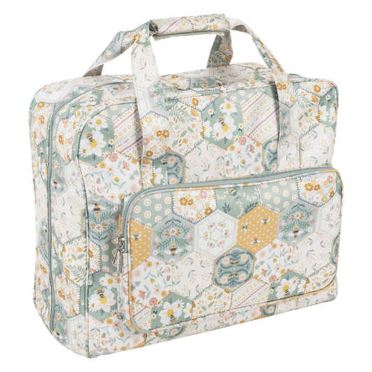 Patchwork Bee Sewing Machine Bag, closed, showing modern patchwork print and handle
