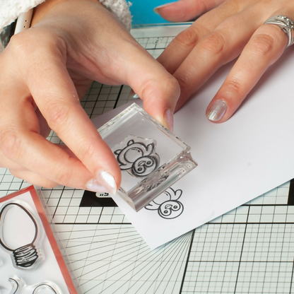 Della by Design Playful Penguins being stamped