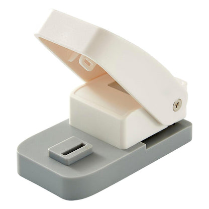White and gray office puncher on a white background