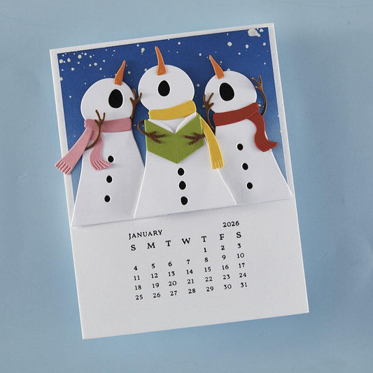 Calendar with snowmen design on a blue background