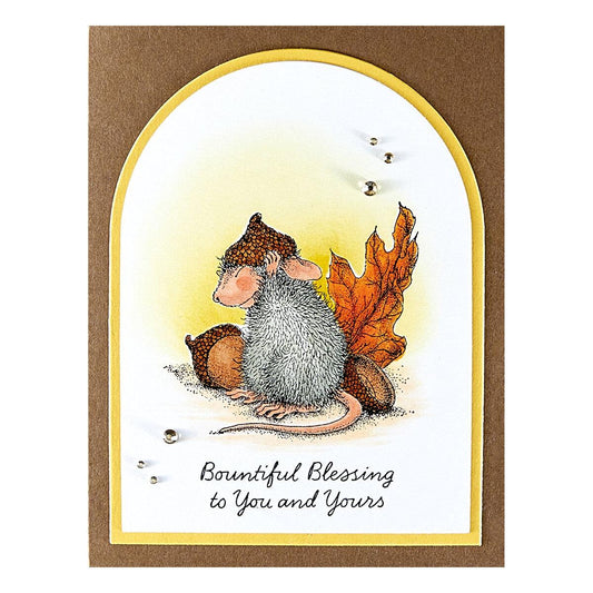 A finished Christmas card featuring a stamped design from the Spellbinders Hats Off to You stamp set.