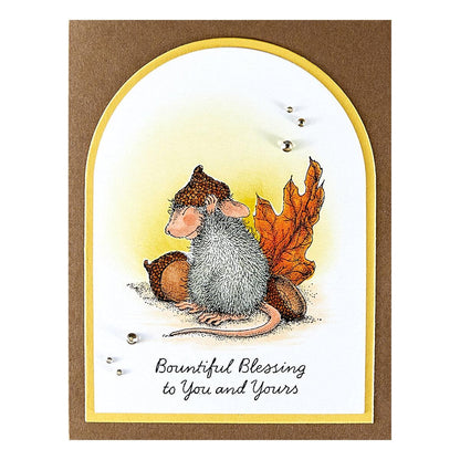 A finished Christmas card featuring a stamped design from the Spellbinders Hats Off to You stamp set.