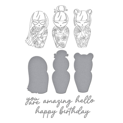 Decorative nesting dolls with intricate designs and text on a white background