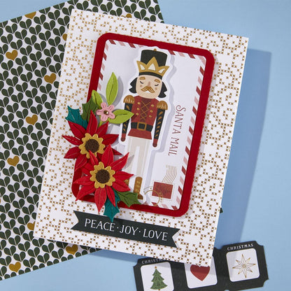 Christmas-themed card with nutcracker and floral design on a patterned background