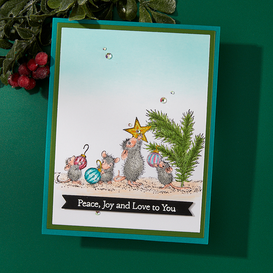 A finished Christmas card featuring a stamped design from the Spellbinders Tree-Mendous Christmas stamp set.