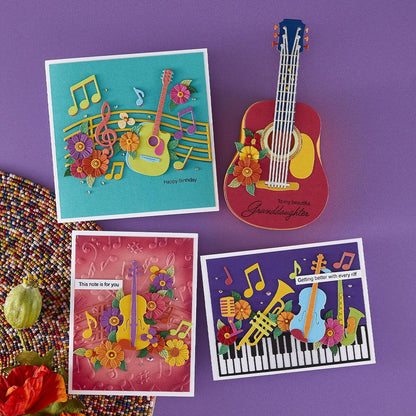 A finished handmade card with musical instruments created with the Small Instruments Bundle.