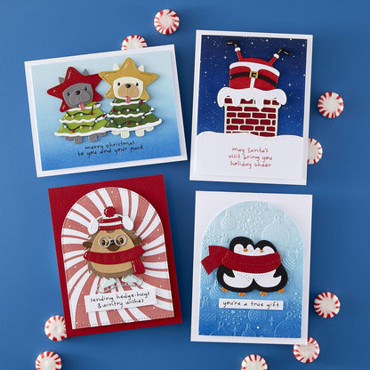 Four Christmas-themed greeting cards on a blue background with candy canes.