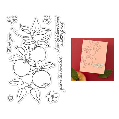 Clear stamp set with apple and leaf designs on a white background, featuring a sample card with text.