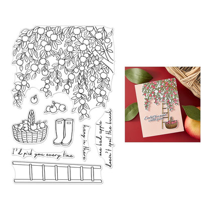 Clear stamp set with tree, basket, boots, and text on a white background