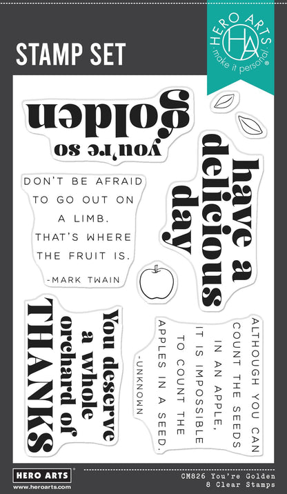 Hero Arts stamp set with various phrases and an apple design on a gray background