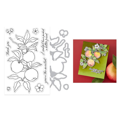 Stamp set with apple design, metal die, and stamped card on a white background