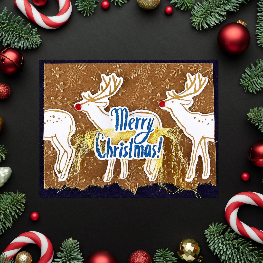 Christmas card with reindeer and 'Merry Christmas!' text, surrounded by festive decorations on a dark background.