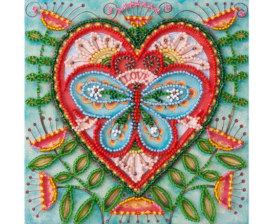 Decorative heart with butterfly design surrounded by floral elements on a light blue background