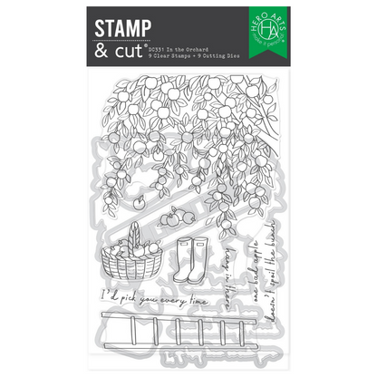 Clear stamp set with orchard-themed design featuring a tree, basket, and boots on a white background.