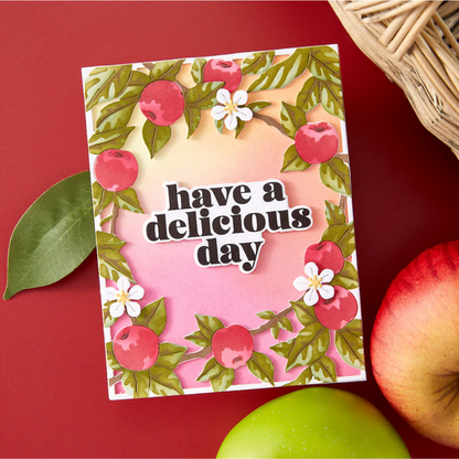 Card with apples and flowers on a red background