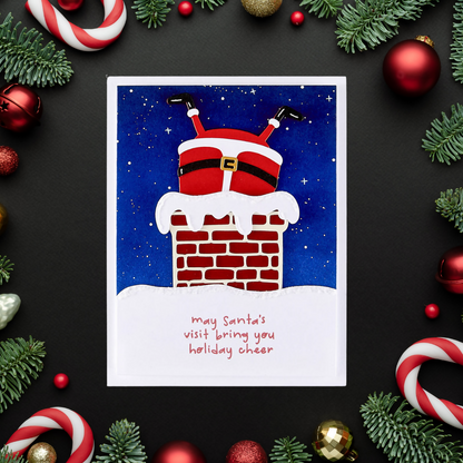 Christmas card with Santa stuck in a chimney surrounded by festive decorations on a dark background.