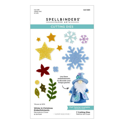 Spellbinders cutting dies packaging with winter-themed embellishments on a white background