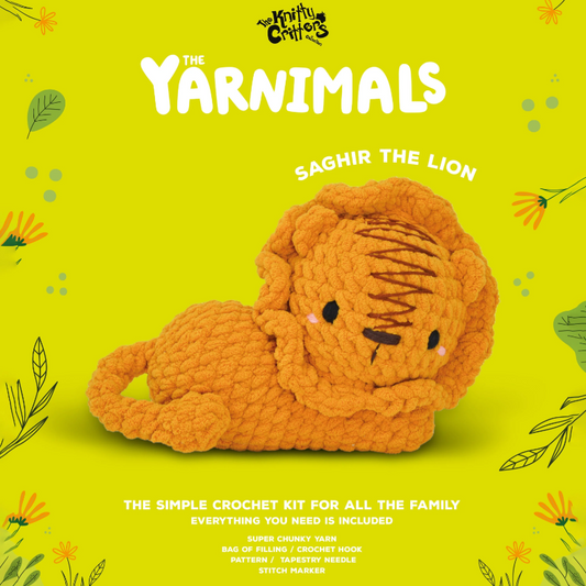 Crocheted lion toy on a green background with 'The Yarnimals' branding.