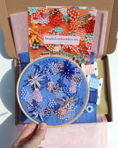 Beaded embroidery kit with completed design and packaging